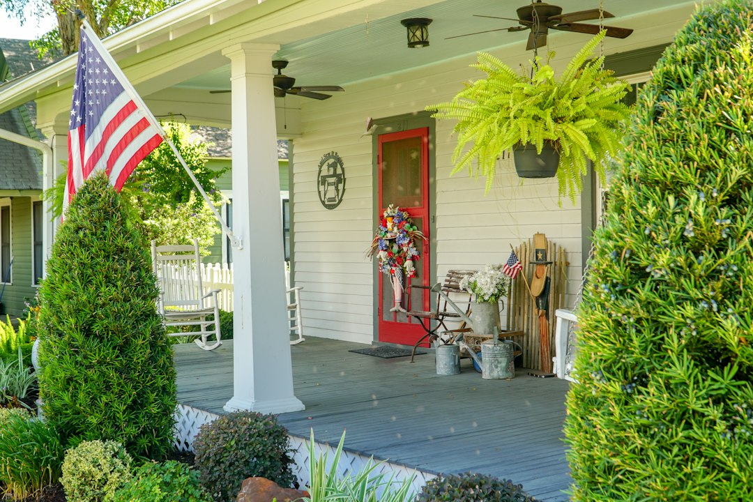 A house with a shaded front porch